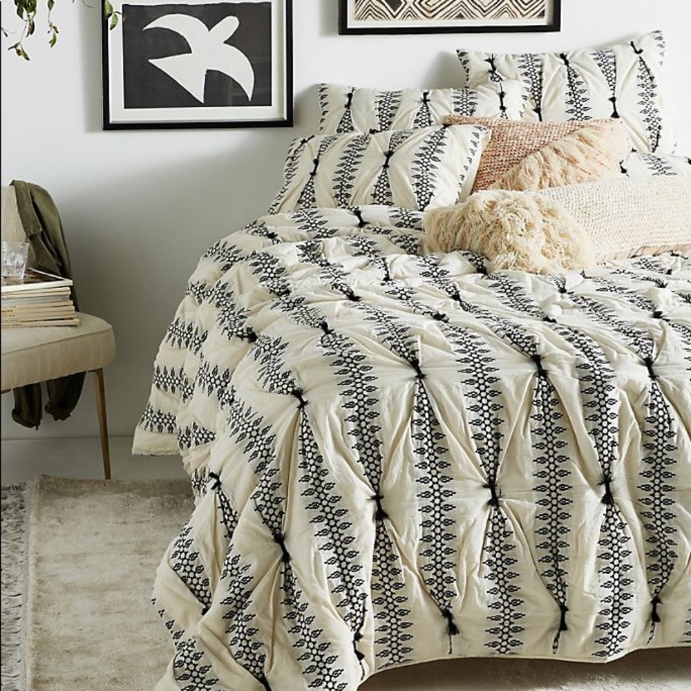 ISO Lilou embroidered quilt by Anthropologie.